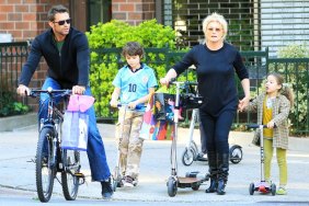 Hugh Jackman, jeans, black sweater, sunglasses, bike, Deborra-Lee Furness